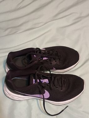 Nike Women's Black Athletic Shoes with Purple Swoosh